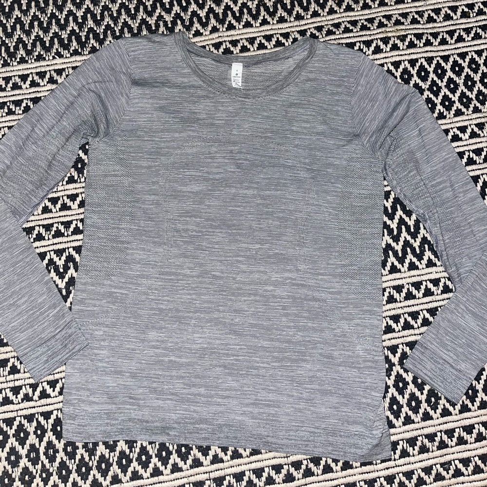 Size 6 white and black striped lulu lemon race length swiftly tech